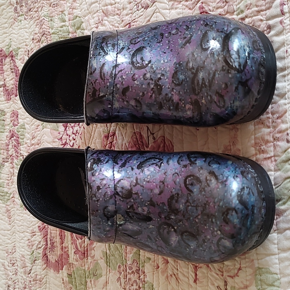 Dansko clogs. Note wear on top-I use a black marker to resolve this issue!